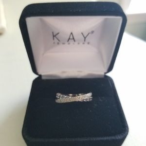 Tanzanite and 1/10 CT. Diamond Cross-Over Ring